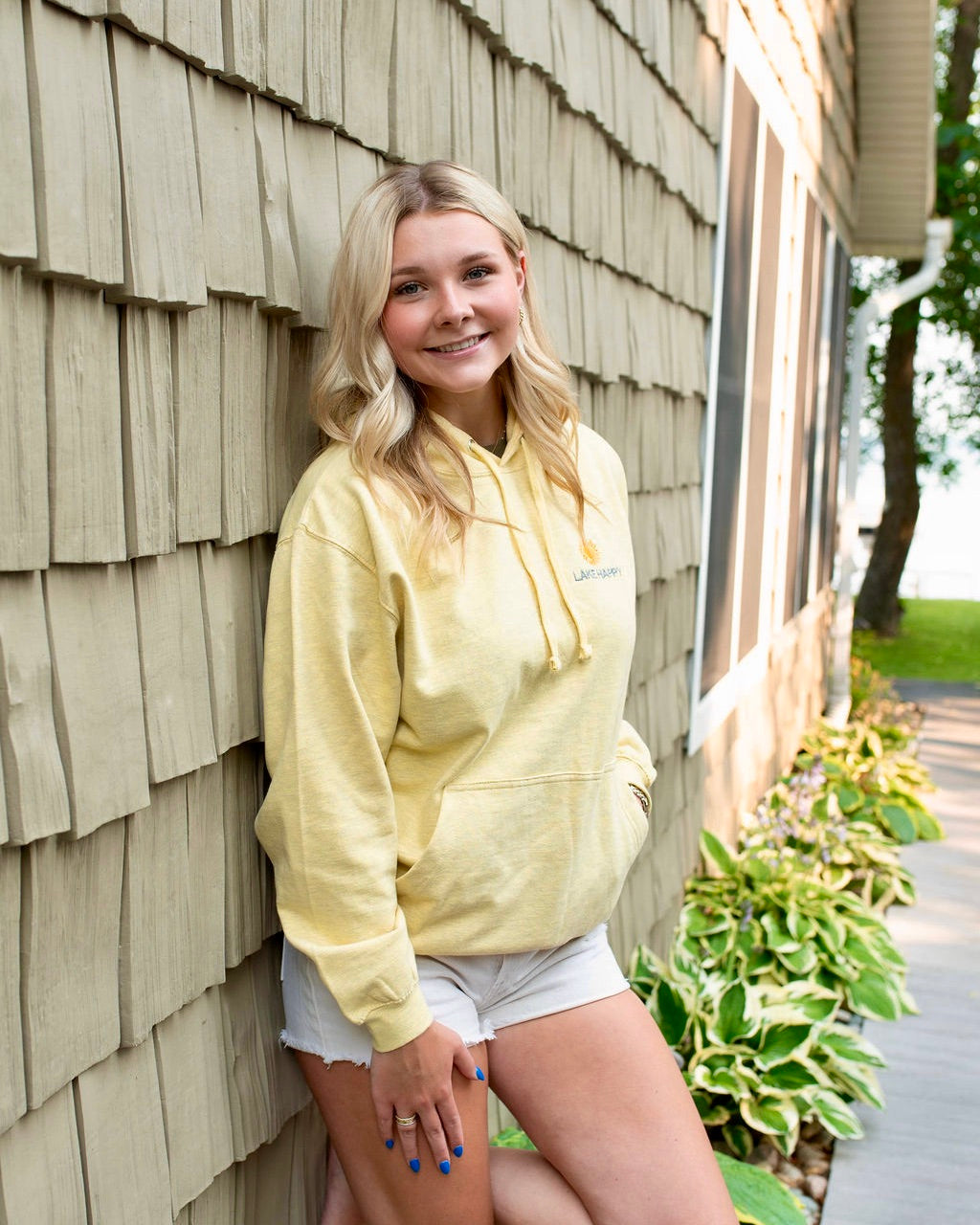 Lake Happy Hooded Sweatshirt Buttercup Yellow Happy Sun Logo